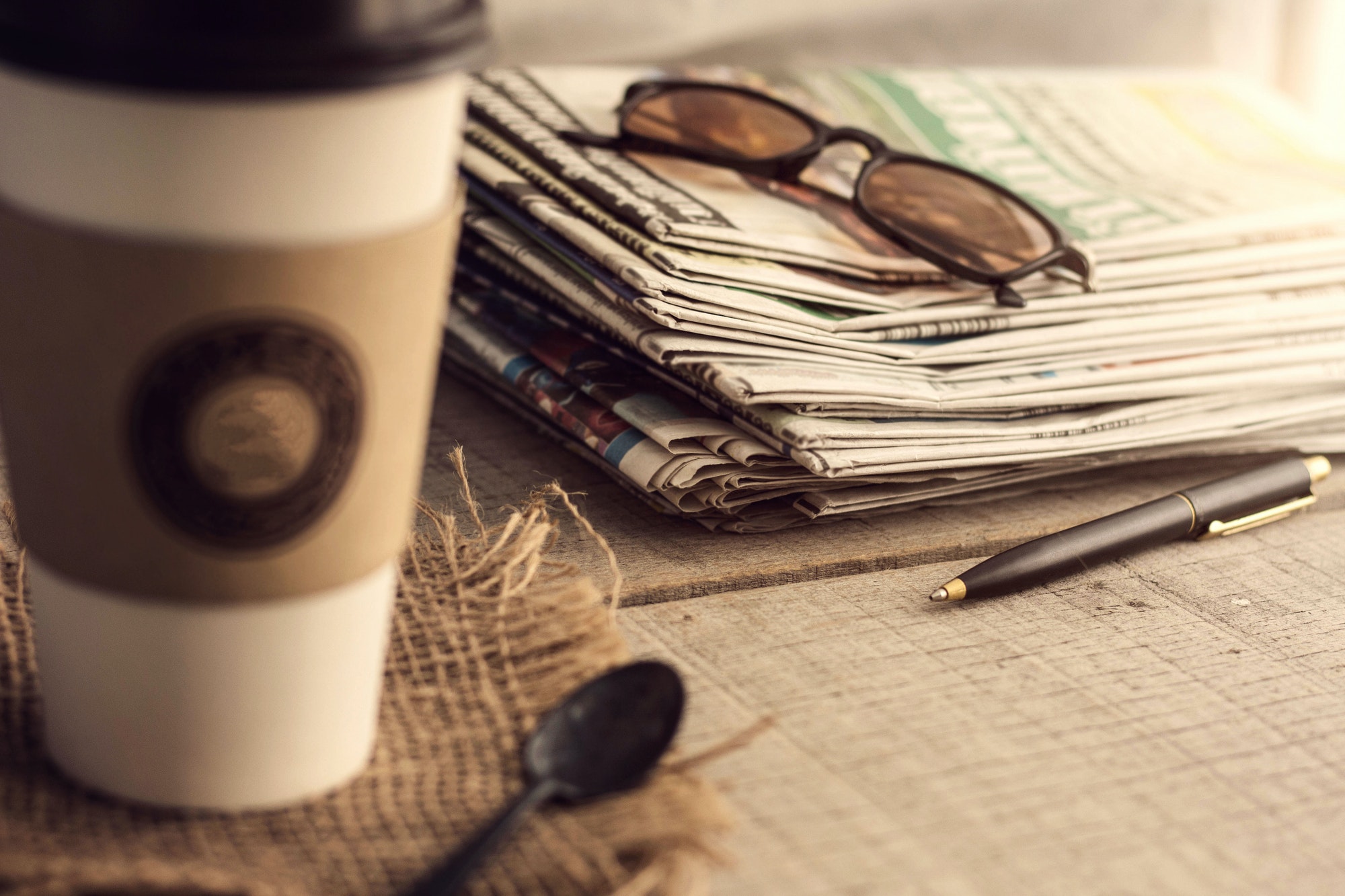 Newspapers on wooden